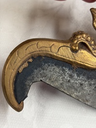A varied collection of 14 Tibetan ritual utensils, 19/20th C.