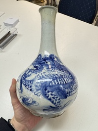 A Korean blue and white 'Dragon' bottle vase, Joseon, 19th C.