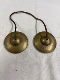 A varied collection of 14 Tibetan ritual utensils, 19/20th C.