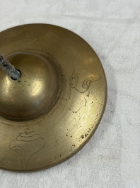 A varied collection of 14 Tibetan ritual utensils, 19/20th C.