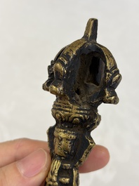 A varied collection of 14 Tibetan ritual utensils, 19/20th C.