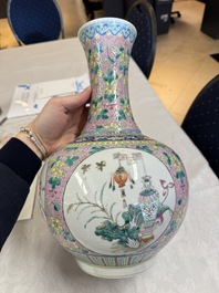 A pair of Chinese famille rose pink-ground 'Ping An Bai Sui 平安百歲' bottle vases, 19th C.