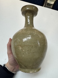 A Korean celadon-glazed sake bottle, Goryeo, 11th C.