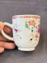 A Chinese famille rose teapot and cover with floral design and three cups, Qianlong