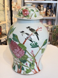 Two Chinese famille rose 'Birds among Flowering Branches' covered vases and a covered jar, 19/20th C.