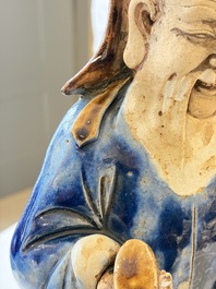 A Chinese polychrome-glazed Shiwan stoneware figure of Tudigong, a 'Shoulao' group and a 'Go Players' group, China marks, 19/20th C.