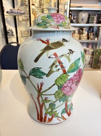 Two Chinese famille rose 'Birds among Flowering Branches' covered vases and a covered jar, 19/20th C.
