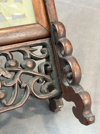 A pair of Chinese jade-inset wooden table screens, a jade-inset wooden ruyi with its original stand and a jade 'bi' disc on a wooden stand, 19/20th C.