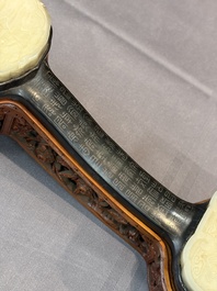 A pair of Chinese jade-inset wooden table screens, a jade-inset wooden ruyi with its original stand and a jade 'bi' disc on a wooden stand, 19/20th C.