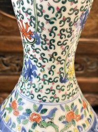 A Chinese blue and white moonflask vase and a wucai garlic-mouth bottle vase, Yongle and Wanli mark, 20th C.