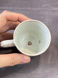 A Chinese famille rose teapot and cover with floral design and three cups, Qianlong