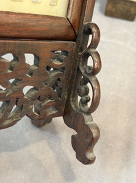 A pair of Chinese jade-inset wooden table screens, a jade-inset wooden ruyi with its original stand and a jade 'bi' disc on a wooden stand, 19/20th C.
