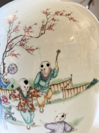 A Chinese famille rose vase, a covered jar and a jardiniere with stand, 19/20th C.