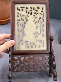 A pair of Chinese jade-inset wooden table screens, a jade-inset wooden ruyi with its original stand and a jade 'bi' disc on a wooden stand, 19/20th C.
