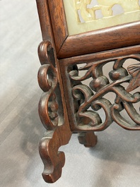 A pair of Chinese jade-inset wooden table screens, a jade-inset wooden ruyi with its original stand and a jade 'bi' disc on a wooden stand, 19/20th C.