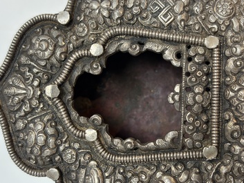 A Tibetan silver and copper Ghau or prayer box, 19th C.