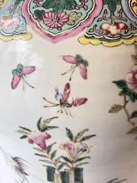 A pair of Chinese famille rose 'Roosters' vases and covers, 19th C.