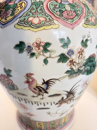 A pair of Chinese famille rose 'Roosters' vases and covers, 19th C.