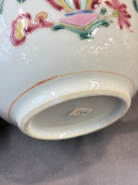 A Chinese famille rose teapot and cover with floral design and three cups, Qianlong