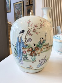 A Chinese famille rose vase, a covered jar and a jardiniere with stand, 19/20th C.