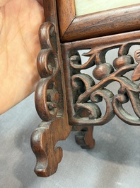 A pair of Chinese jade-inset wooden table screens, a jade-inset wooden ruyi with its original stand and a jade 'bi' disc on a wooden stand, 19/20th C.