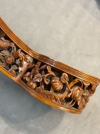 A pair of Chinese jade-inset wooden table screens, a jade-inset wooden ruyi with its original stand and a jade 'bi' disc on a wooden stand, 19/20th C.