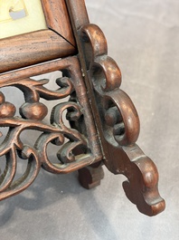 A pair of Chinese jade-inset wooden table screens, a jade-inset wooden ruyi with its original stand and a jade 'bi' disc on a wooden stand, 19/20th C.