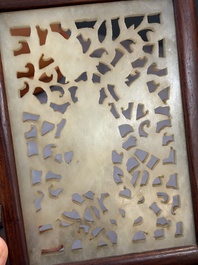 A pair of Chinese jade-inset wooden table screens, a jade-inset wooden ruyi with its original stand and a jade 'bi' disc on a wooden stand, 19/20th C.