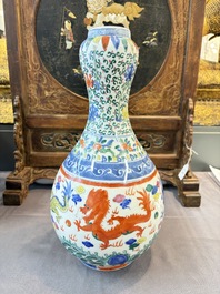 A Chinese blue and white moonflask vase and a wucai garlic-mouth bottle vase, Yongle and Wanli mark, 20th C.