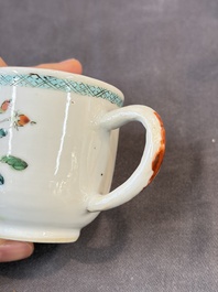A Chinese famille rose teapot and cover with floral design and three cups, Qianlong