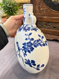 A Chinese blue and white moonflask vase and a wucai garlic-mouth bottle vase, Yongle and Wanli mark, 20th C.