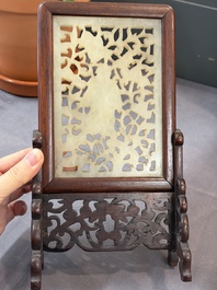 A pair of Chinese jade-inset wooden table screens, a jade-inset wooden ruyi with its original stand and a jade 'bi' disc on a wooden stand, 19/20th C.
