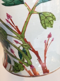 Two Chinese famille rose 'Birds among Flowering Branches' covered vases and a covered jar, 19/20th C.