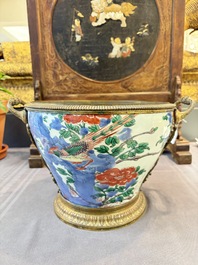 A Chinese wucai covered vase with narrative design and a jar mounted as a wine cooler, Transitional period