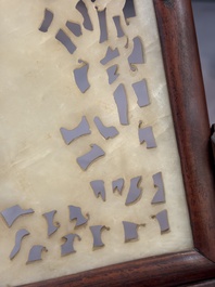 A pair of Chinese jade-inset wooden table screens, a jade-inset wooden ruyi with its original stand and a jade 'bi' disc on a wooden stand, 19/20th C.