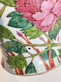 Two Chinese famille rose 'Birds among Flowering Branches' covered vases and a covered jar, 19/20th C.