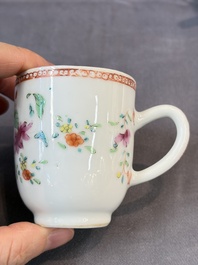 A Chinese famille rose teapot and cover with floral design and three cups, Qianlong