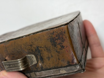 A Tibetan silver and copper Ghau or prayer box, 19th C.