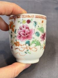 A Chinese famille rose teapot and cover with floral design and three cups, Qianlong