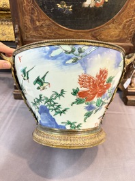 A Chinese wucai covered vase with narrative design and a jar mounted as a wine cooler, Transitional period