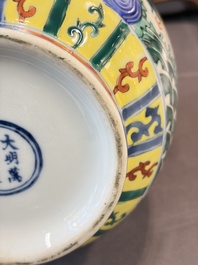 A Chinese blue and white moonflask vase and a wucai garlic-mouth bottle vase, Yongle and Wanli mark, 20th C.