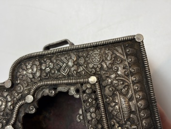 A Tibetan silver and copper Ghau or prayer box, 19th C.