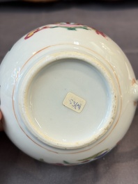 A Chinese famille rose teapot and cover with floral design and three cups, Qianlong