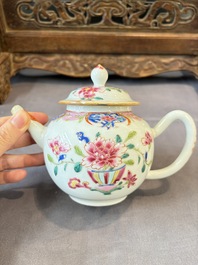 A Chinese famille rose teapot and cover with floral design and three cups, Qianlong