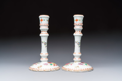 A pair of Chinese famille rose candlesticks with floral design, Qianlong