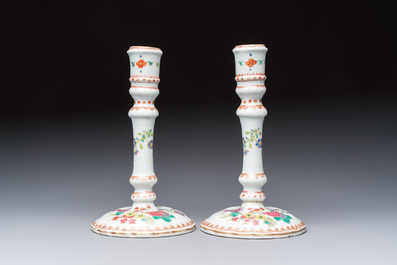 A pair of Chinese famille rose candlesticks with floral design, Qianlong
