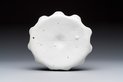 A Chinese Dehua blanc de Chine 'Lotus Leaf and Frog' brush washer on a wooden stand, Kangxi/Yongzheng