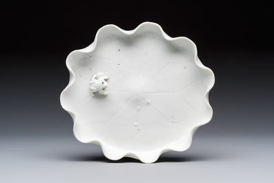 A Chinese Dehua blanc de Chine 'Lotus Leaf and Frog' brush washer on a wooden stand, Kangxi/Yongzheng