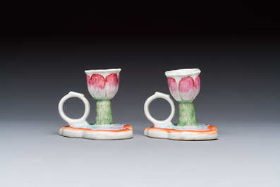 A pair of Chinese export famille rose lotus-form chambersticks on ruyi-shaped bases, Qianlong