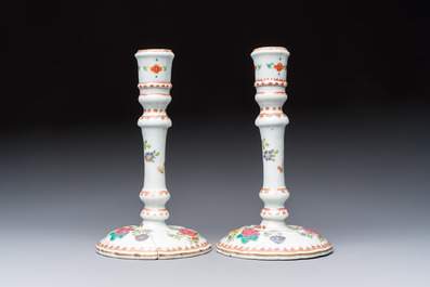 A pair of Chinese famille rose candlesticks with floral design, Qianlong